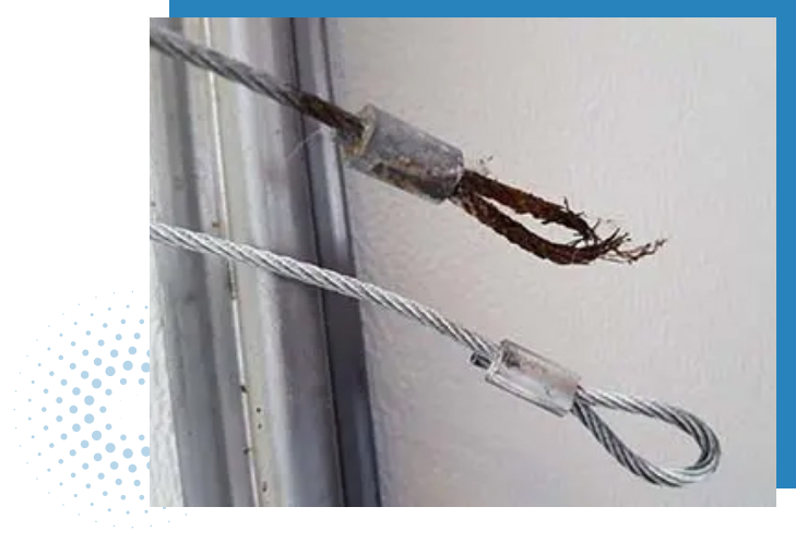 Garage door cable snapped - urgent repair needed