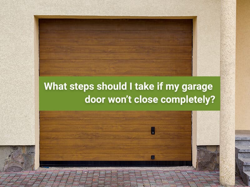 What steps should I take if my garage door won’t close completely