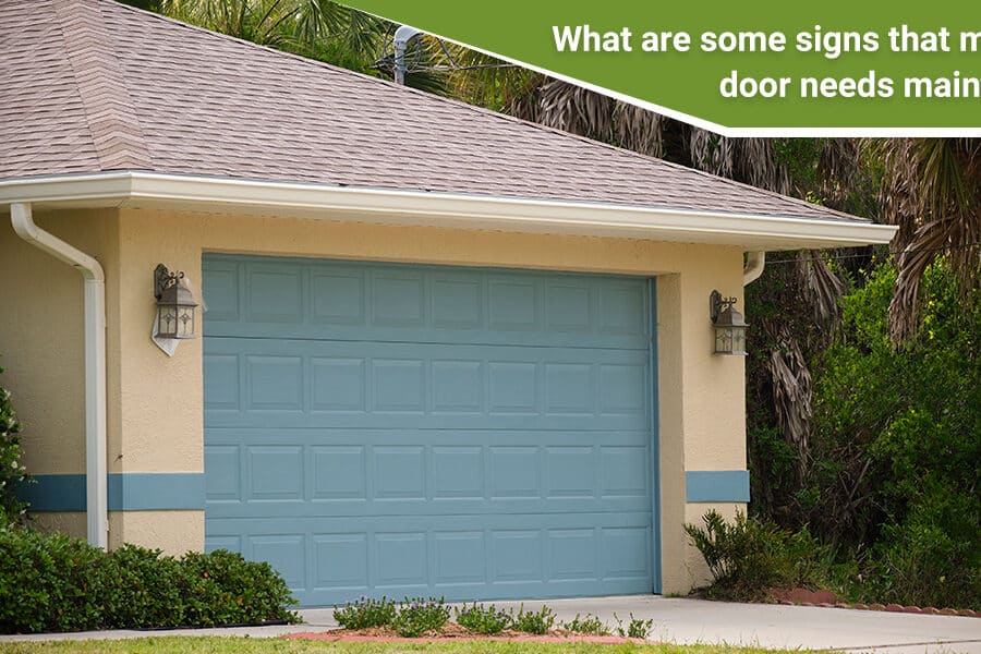 What are some signs that my garage door needs maintenance